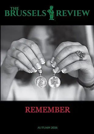 The Brussels Review Remember cover with a photograph of hands holding pendants
